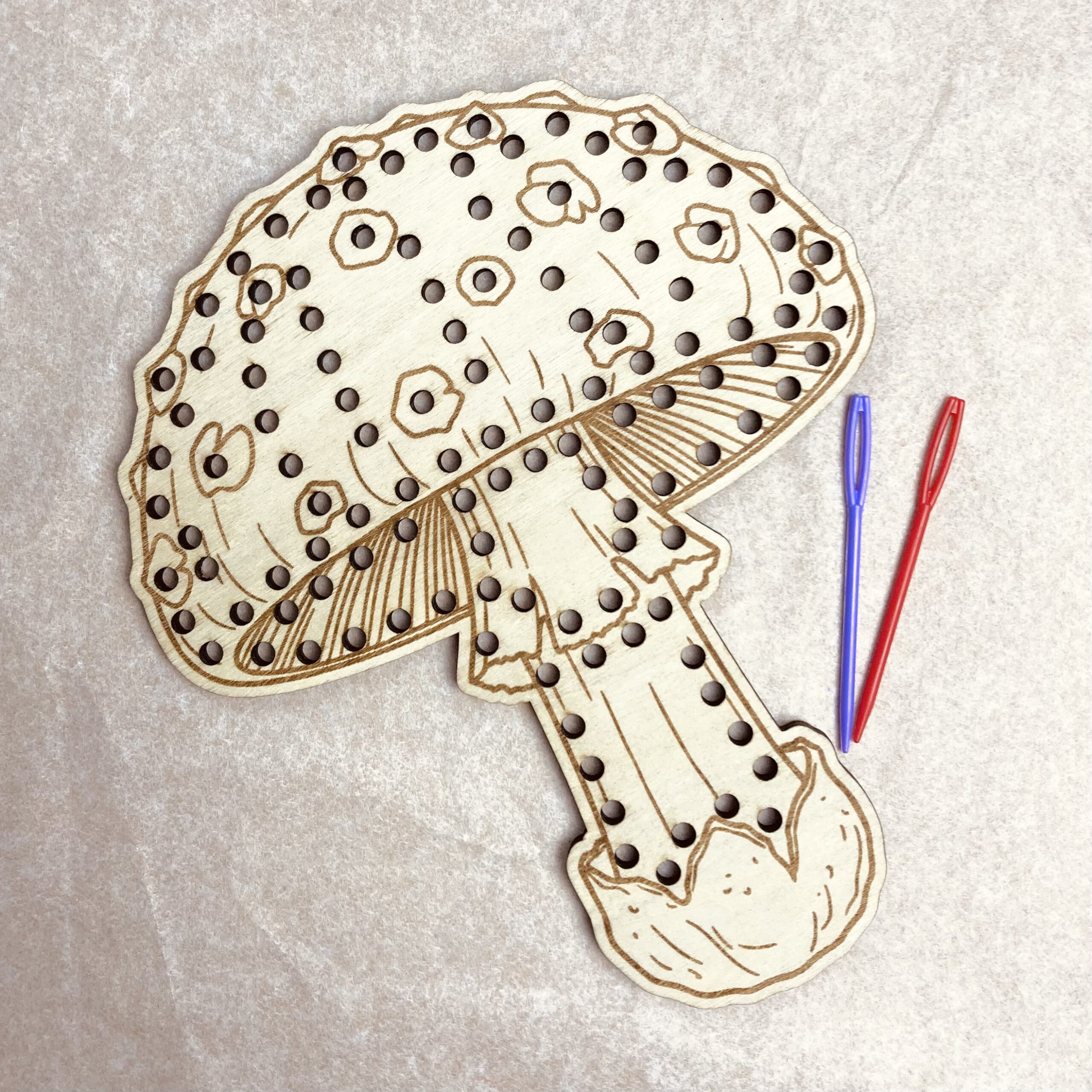 Champignon à broder lacer
